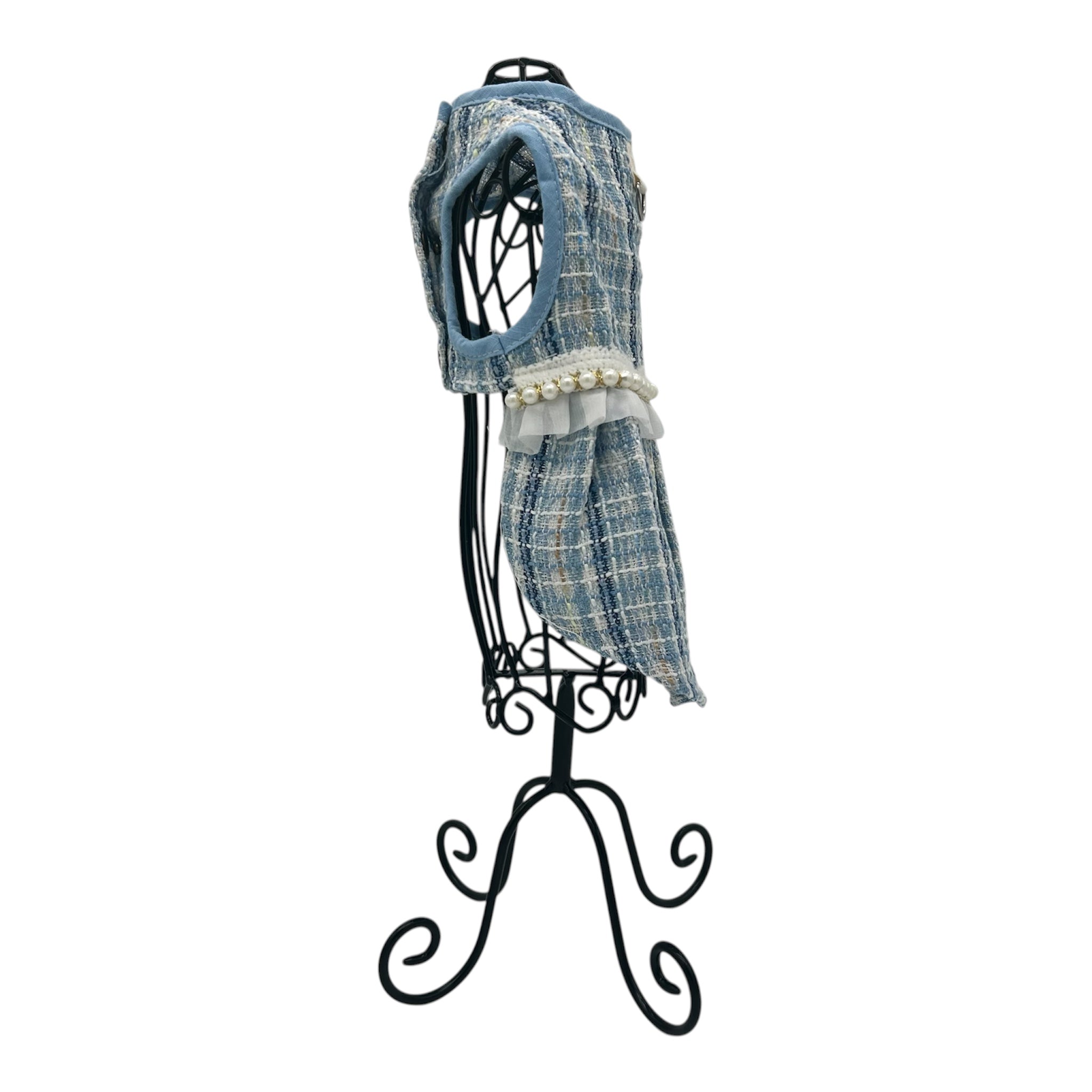 plaid cat dress on a black mannequin with a white background