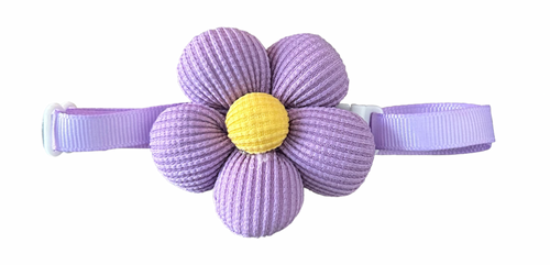 Purple flower-shaped cat collar with a yellow center on a white background