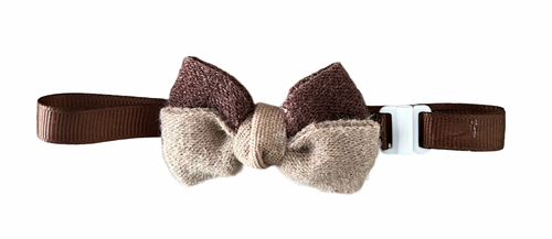 Bow tie with brown and beige pattern on a white background