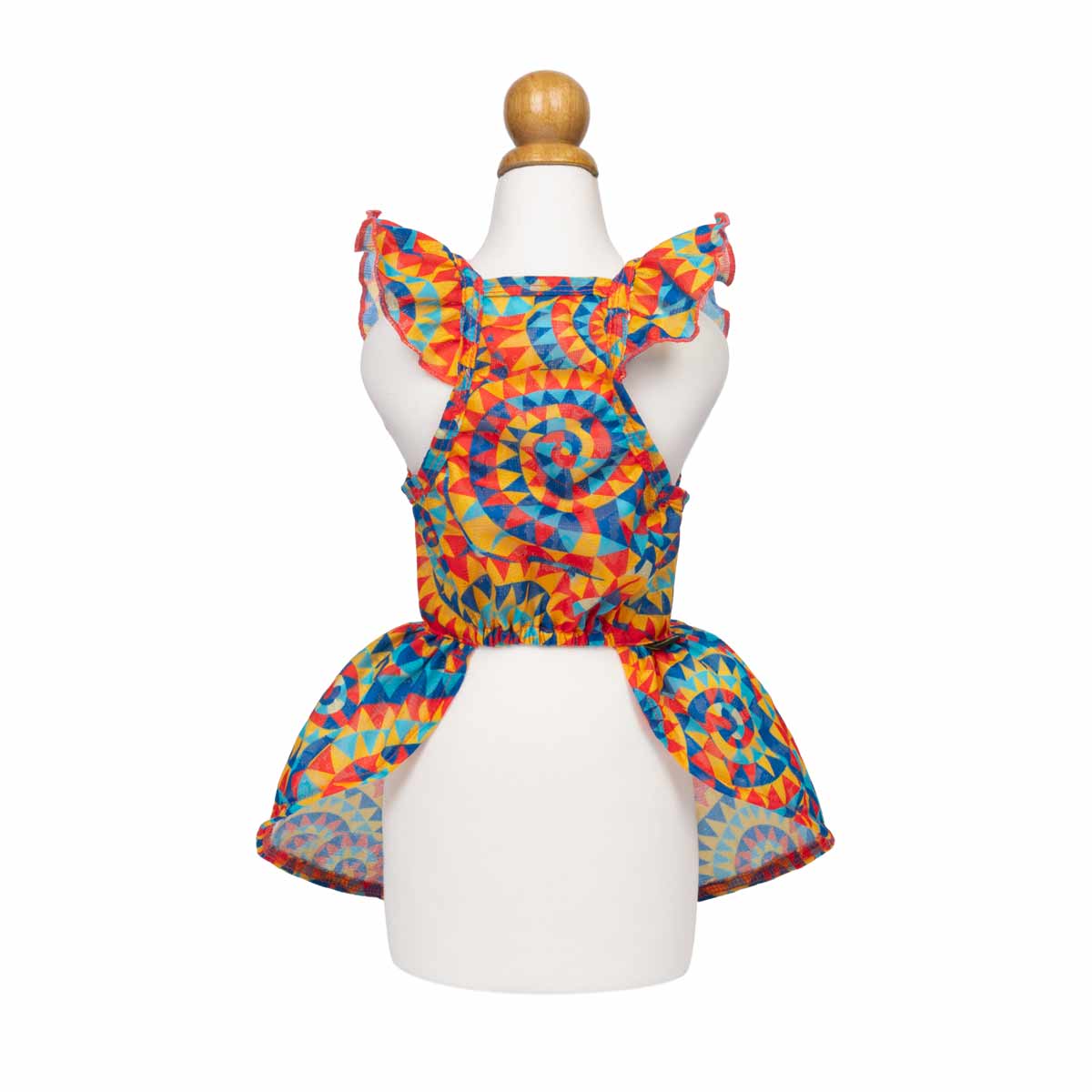 Colorful cat dress on a mannequin against a white background