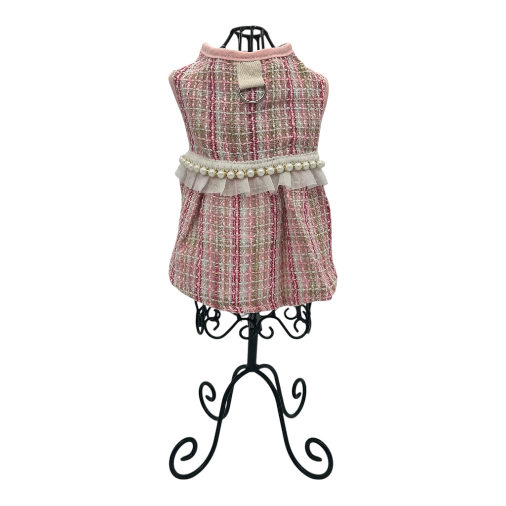 cat dress with plaid pattern and pearl details on a mannequin against a white background