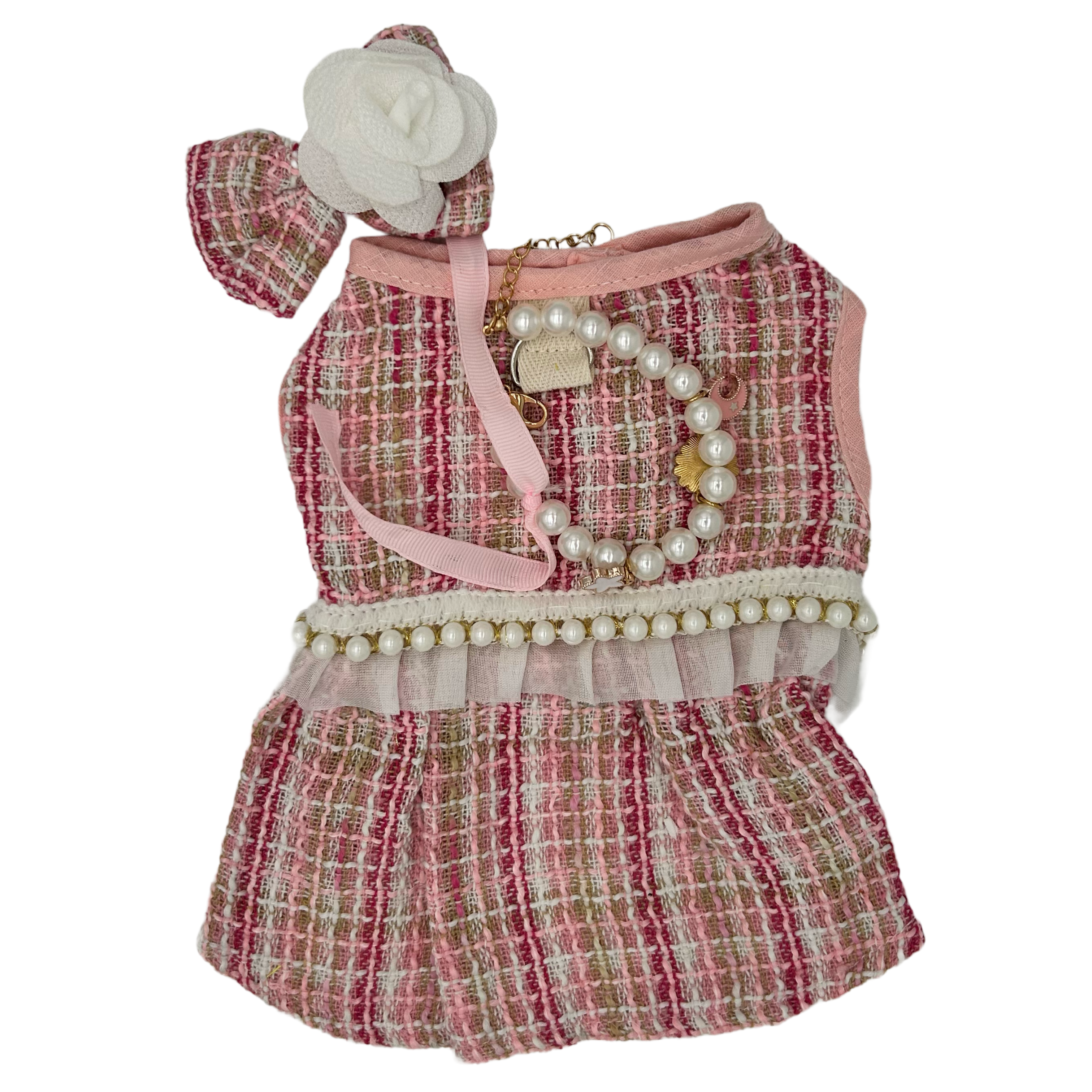 Cat dress with pearl details and matching headband on a white background