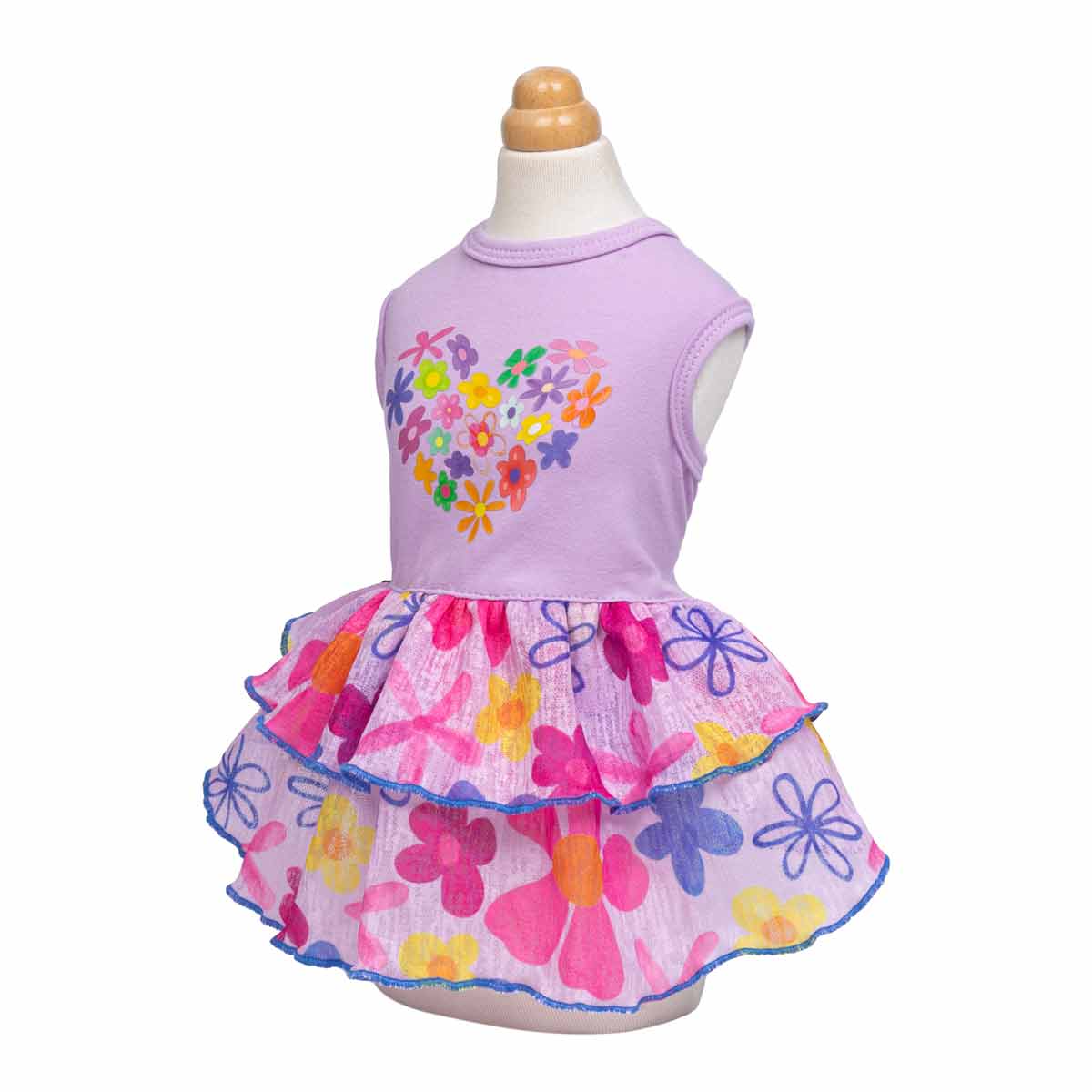 Cat dress with floral design on a mannequin against a white background